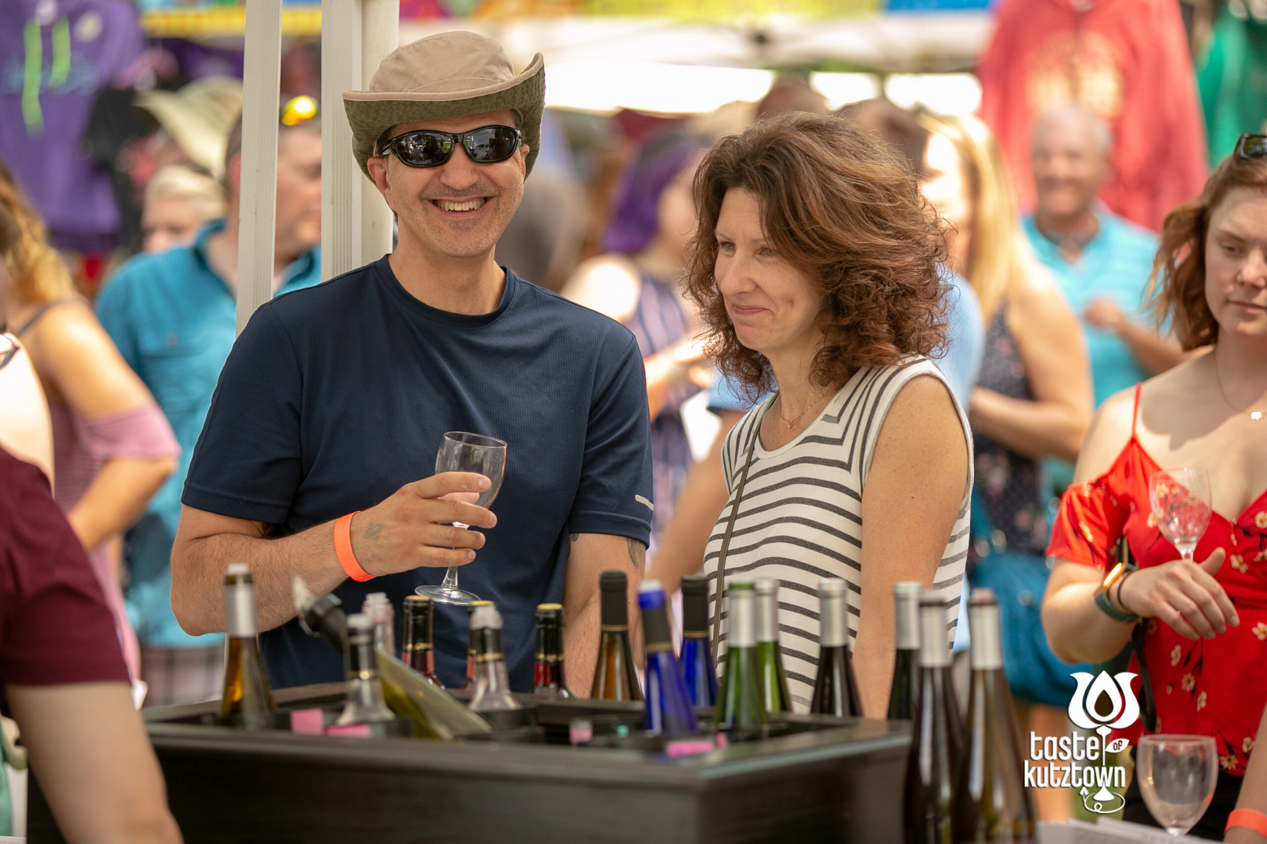 Taste of Kutztown Wine and Beer Festival Couple posing with wine glasses